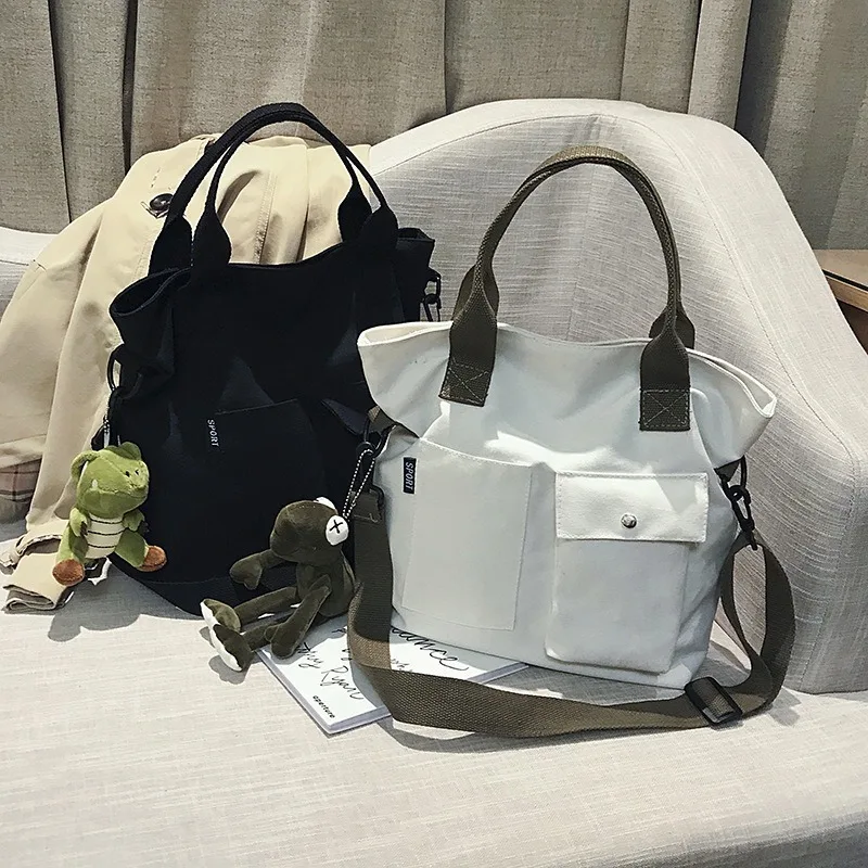 

Canvas large bag female bag new leisure large capacity student class solid color portable tote bag bag shoulder messenger bag