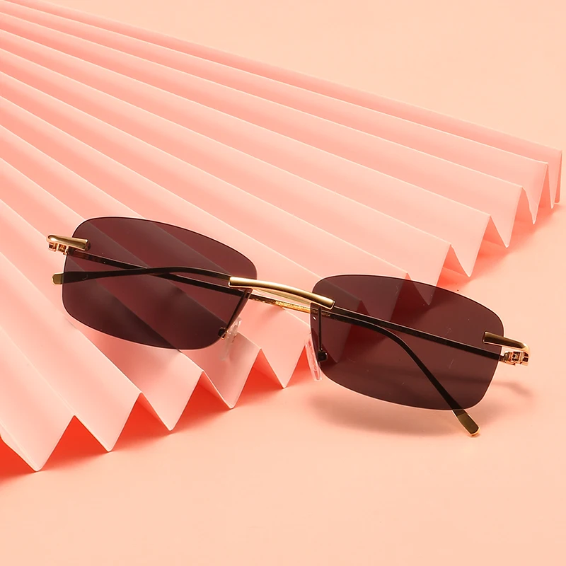 

Новинка, модные маленькие прямоугольные солнцезащитные очки, женские Квадратные Солнцезащитные очки без оправы для женщин, лето 2021, стильн...