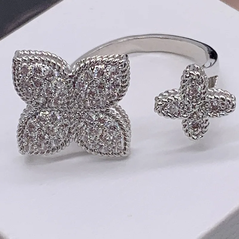 

Japanese and Korean new four-leaf flower ring full diamond zircon size flower open index finger ring ring luxury wild trendy wom
