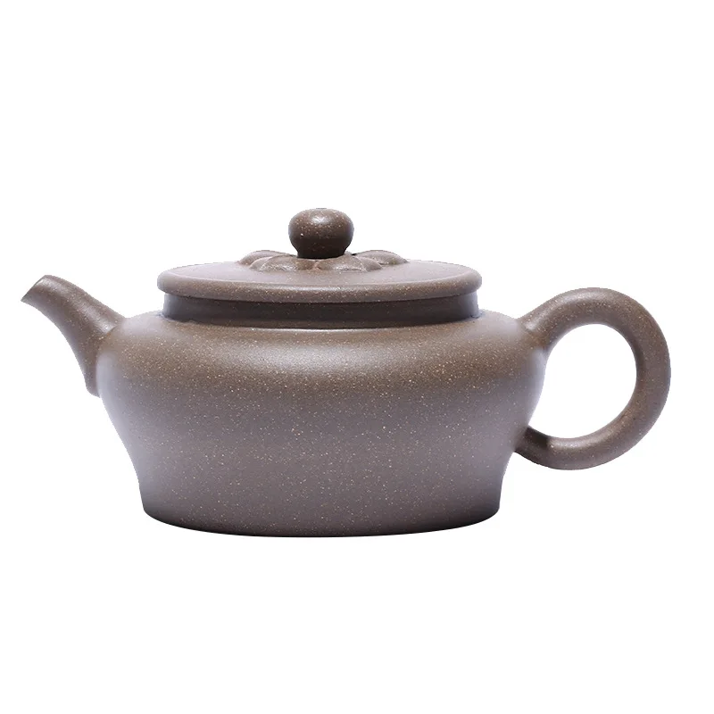 

Famous craftsman's hand engraving for gift of clay lotus teapot in Yixing raw ore section