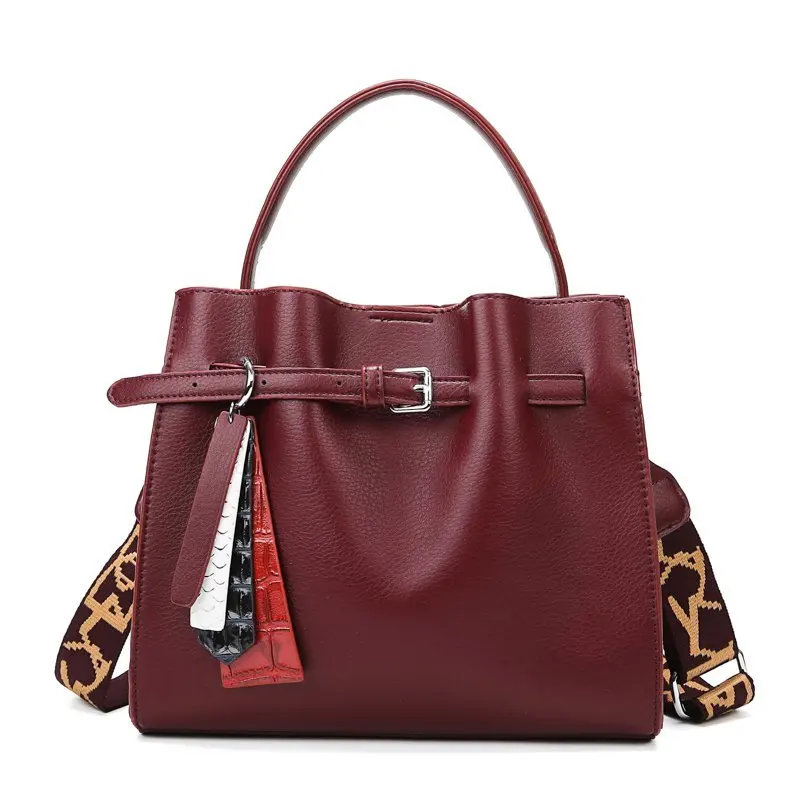 

The new fashion lady handbags pure color leather mini inclined female bag zipper bag, pillow shape women single shoulder ba