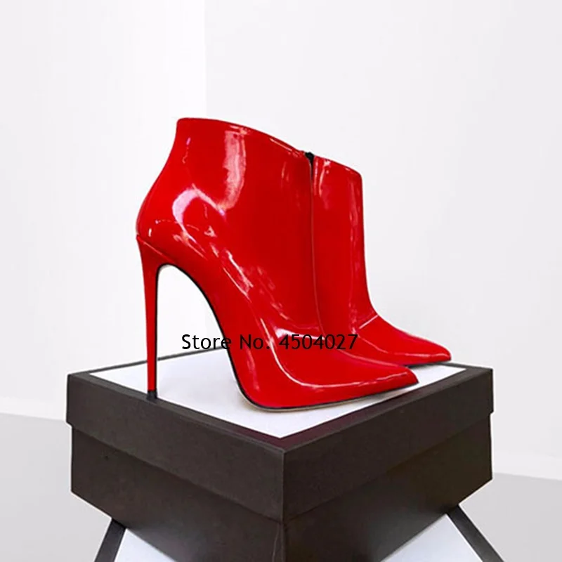

Красные лакированные кожаные ботильоны на тонком высоком каблуке с острым носком