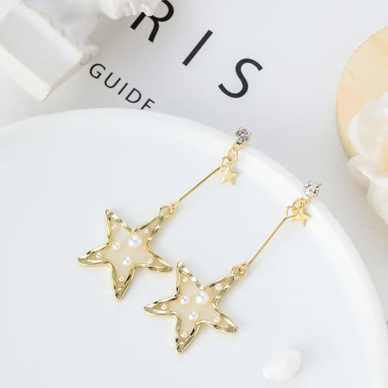 

S925 Silver Needle Fashion Girl Transparent Five-pointed Star Pearl Pendant Chen Long Earrings