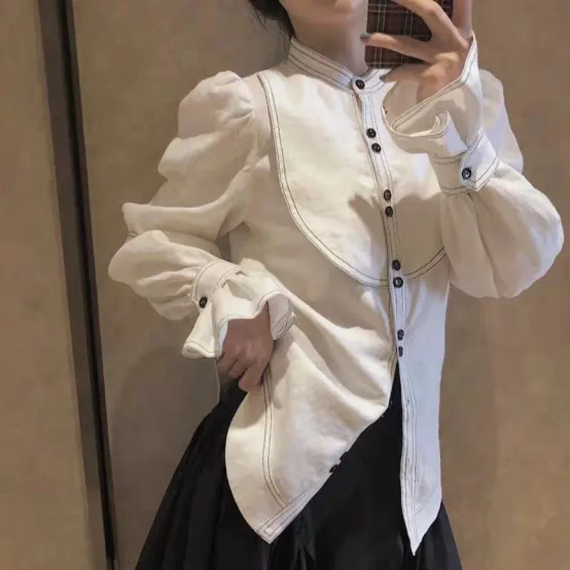 2020 new autumn and winter stand collar lantern sleeves single breasted white contrast black shirt female blouse K898