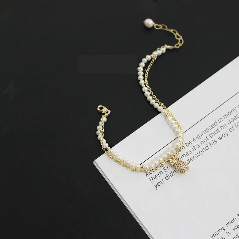 

Fashion Micro Zirconia Lucky Bag Shap Bracelet for Women Gifts for the New Year Delicate Freshwater Pearl Beaded Bracelets SL003