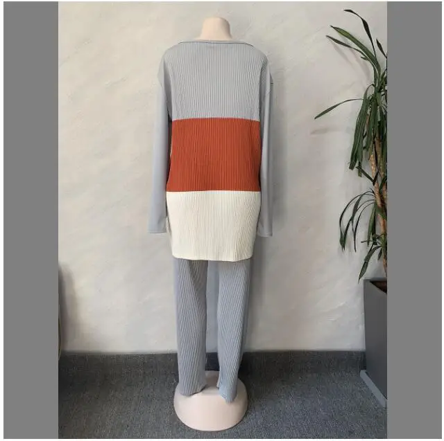 

Large Size 4xl Spring Patchwork Women long sleeve o-neck top pencil long pants suit Casual Fold African sport two piece set trac