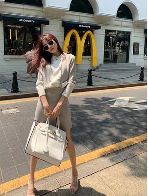 

Drop Shipping 2020 New Autumn Women's Suits Fashion Pullovers Knit Tops + Package Hip Skirt 2 pieces Sets Conjuntos Feminino