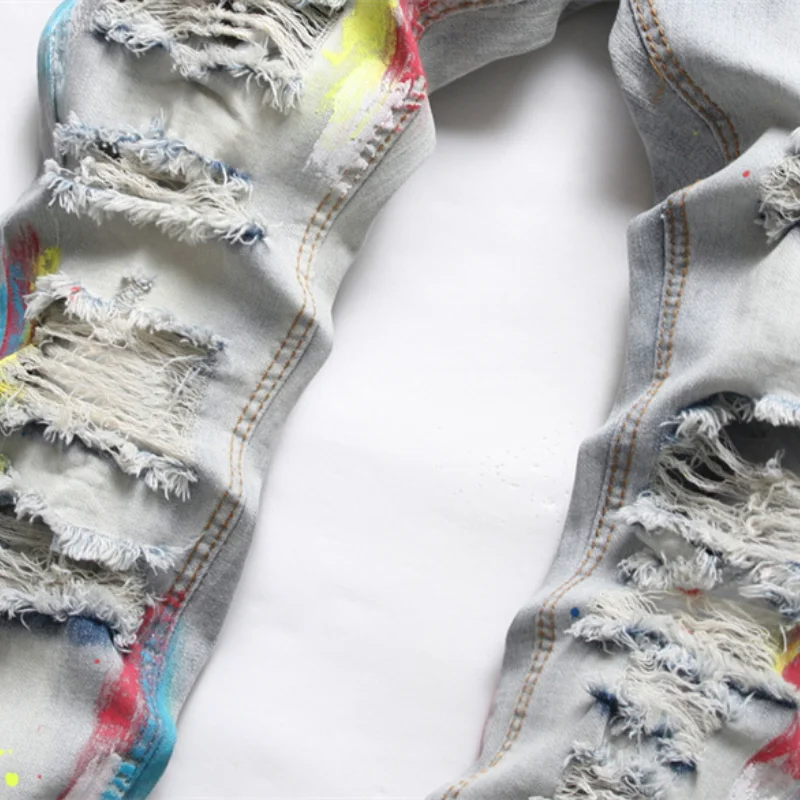 Korean Fashion Multicolour Graffiti Hip Hop Men Pencil Jeans Trousers Hole Ripped Slim Denim Pants For Nightclub Pantaloni Uomo