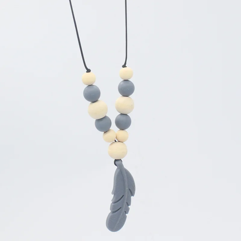 Juguete de dentici&oacute;n para beb&eacute;, mordedor de silicona para entrenamiento de beb&eacute;, collar con colgante de pluma, cuentas de juguete para masticar, chupete, Clip, juguetes, regalos-1