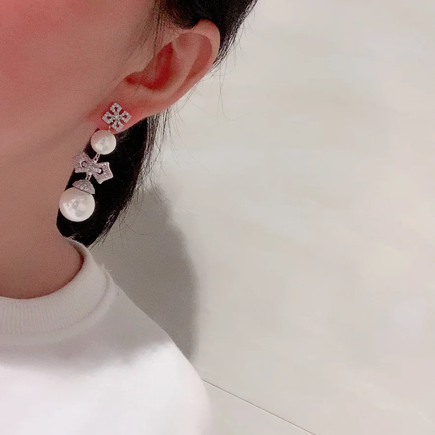 

Hollow cross earrings sweet online celebrity dual-purpose atmosphere round face slim double-sided pearl earrings