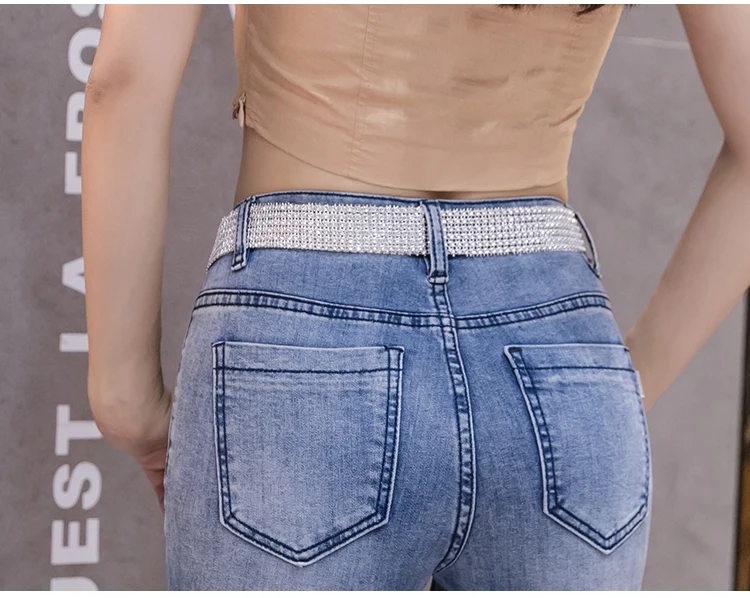 

Spring 2021 New Light Blue Diamond Tassel Bead Jeans Female High Waist Slimming Irregular Denim Flare Pants Ladies