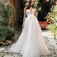 wedding dress a line sweetheart sleeveless bow lace appliques sequined backless floor length sweep train bride gown 2021