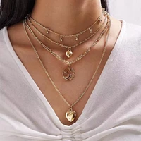 retro fashion simple metal necklace ladies alloy hollow figure love ball pendant light luxury versatile multi layered jewelry