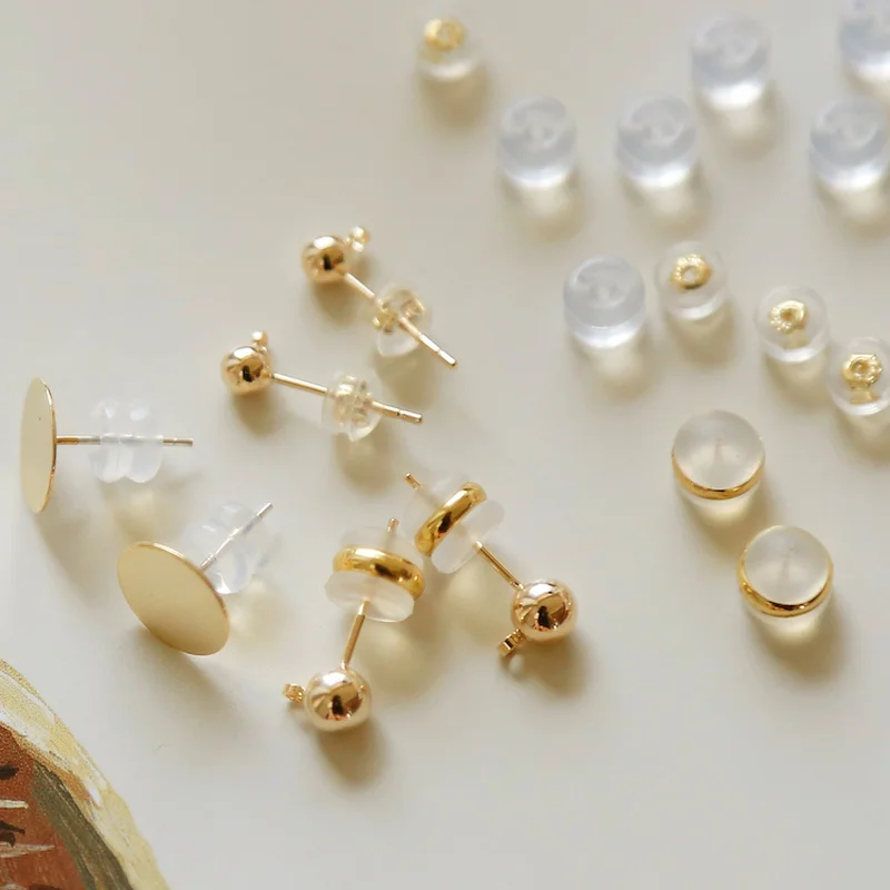 

18k gold hypoallergenic medical silicon earplugs, ear plugs, allergy-like transparent earrings