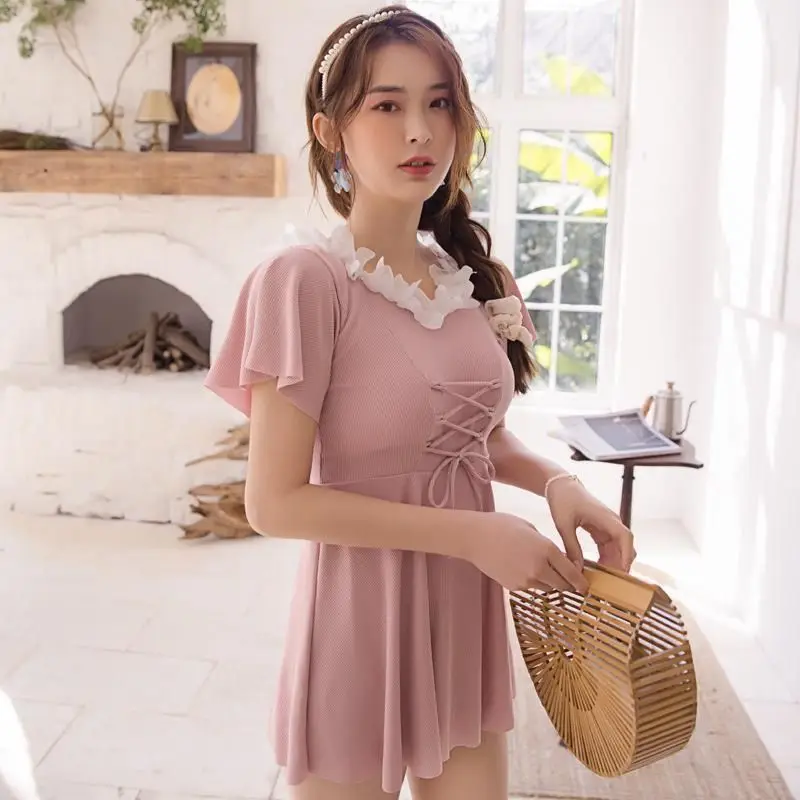 

Купальный костюм женский консервативный студенческий корейский пикантный цельный костюм с собранной грудью облегающий купальный костюм д...