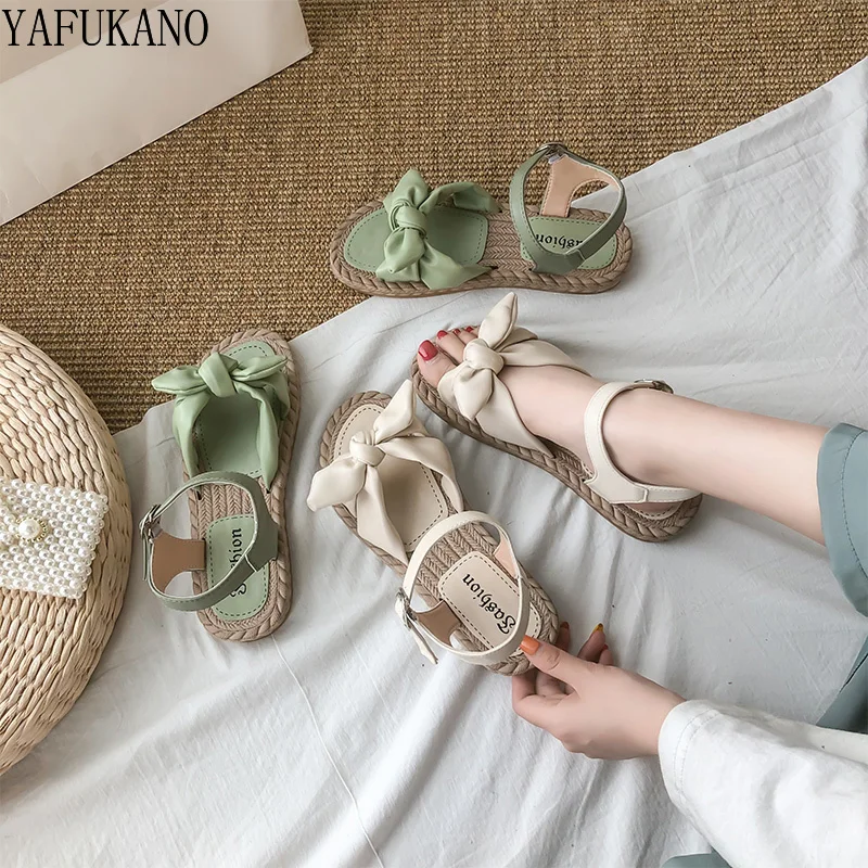 

Summer New Flat Sandals Female Fairy Style Sweet Bow-Knot Casual Student Sandalies Retro Roman Shoes Elegant Dress Women Shoes
