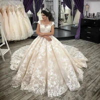 luxury ball gown wedding dresses princess design cap sleeve champagne tulle ivory appliques lace bridal gown vestido de noiva