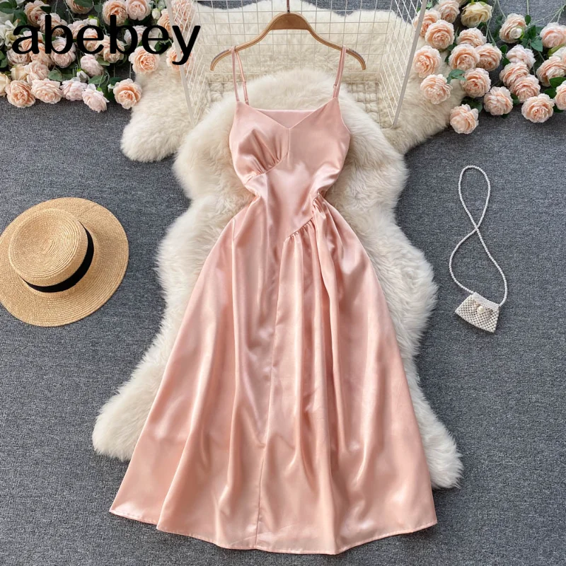 

Женское атласное платье на бретельках, модное корейское асимметричное вечернее платье-трапеция без рукавов, пикантный пляжный сарафан с от...