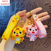 50pcs cartoon silicone pink yellow cute small tiger key chain mens and womens jewelry bag pendant children lovely with bell