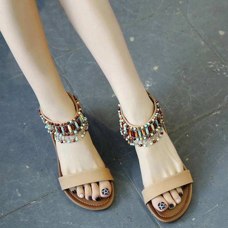 

Богемные этнические стильные женские сандалии 2021 летняя туристическая обувь с подвесными бусинами и открытым носком с кисточками и бусина...