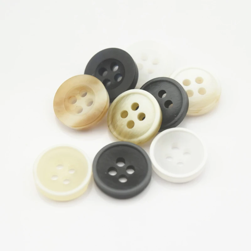 

Пуговицы мужские черно-белые полимерные с четырьмя отверстиями, 1000 шт.