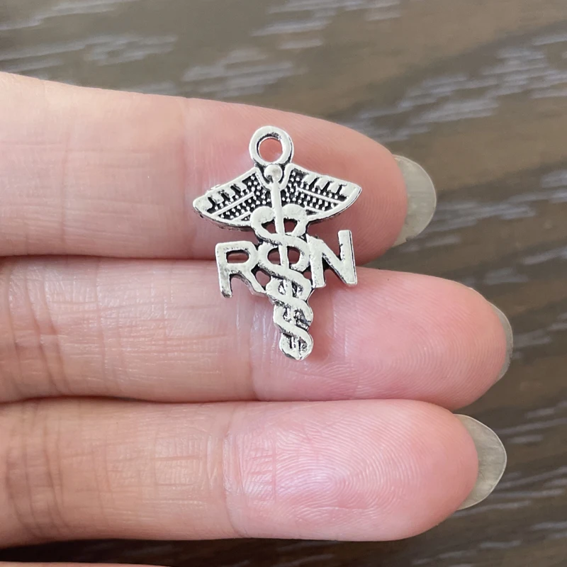

20PCS DIY Jewelry Making Nurse RN Charms Zinc Alloy RN Pendant Charm for Bracelet Necklaces Earrings Bookmarks Zipper Pulls