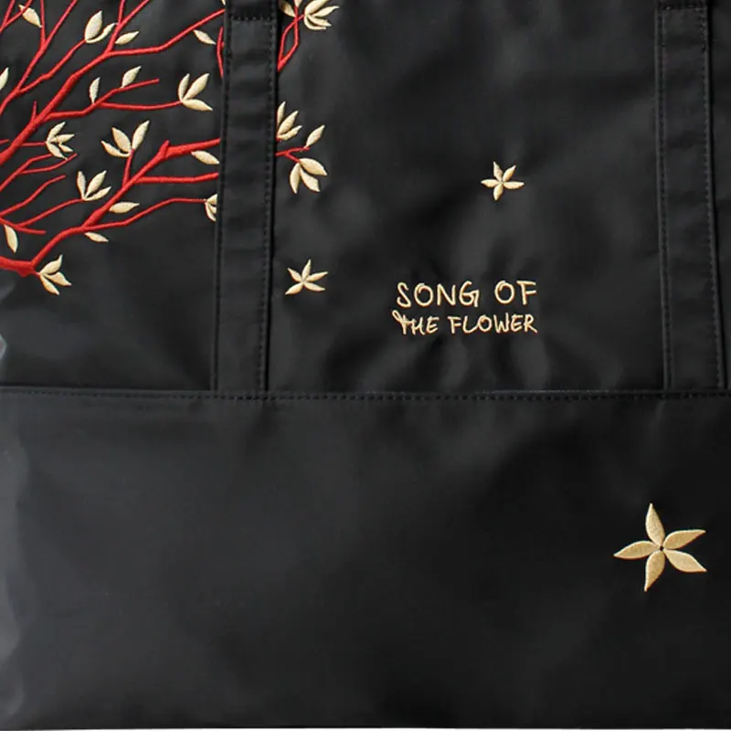 

Huajian Princess song of flowers 2021 spring new embroidery original design single shoulder bag hand bag nylon women's bag
