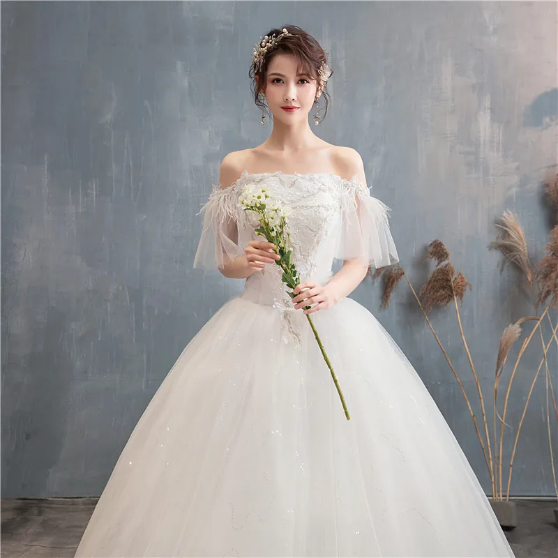 Новое Элегантное свадебное платье с вырезом лодочкой перьями и бисером вышивкой