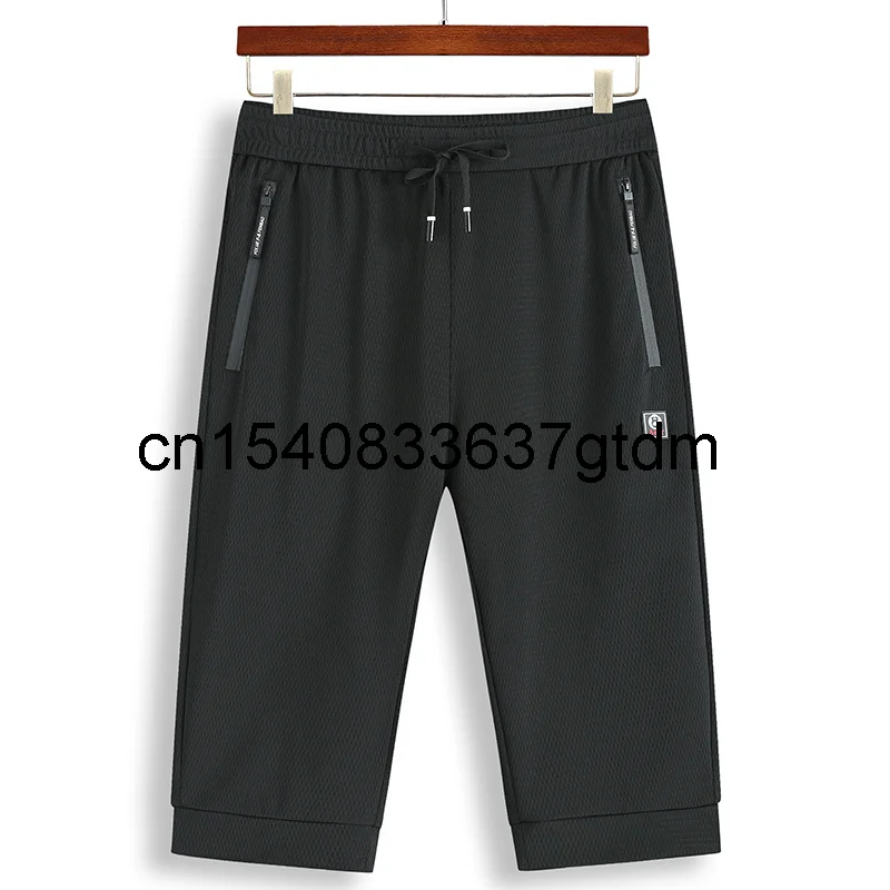

Новая летняя мужская полнит размера плюс, модные повседневные брюки «Капри» для мужчин толстые Сетчатые эластичные быстро высыхающая Штан...