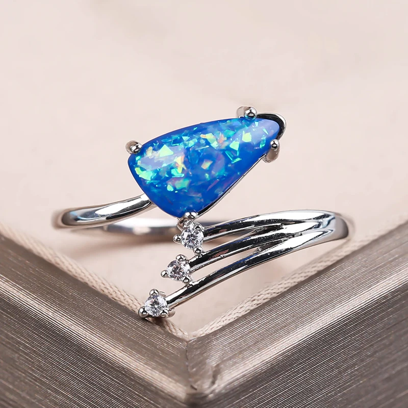 

Exquisite Irregular Blue Stone Ring For Women Creative 3 Claw Opal Open Rings Jewelry Special Men Party Gifts