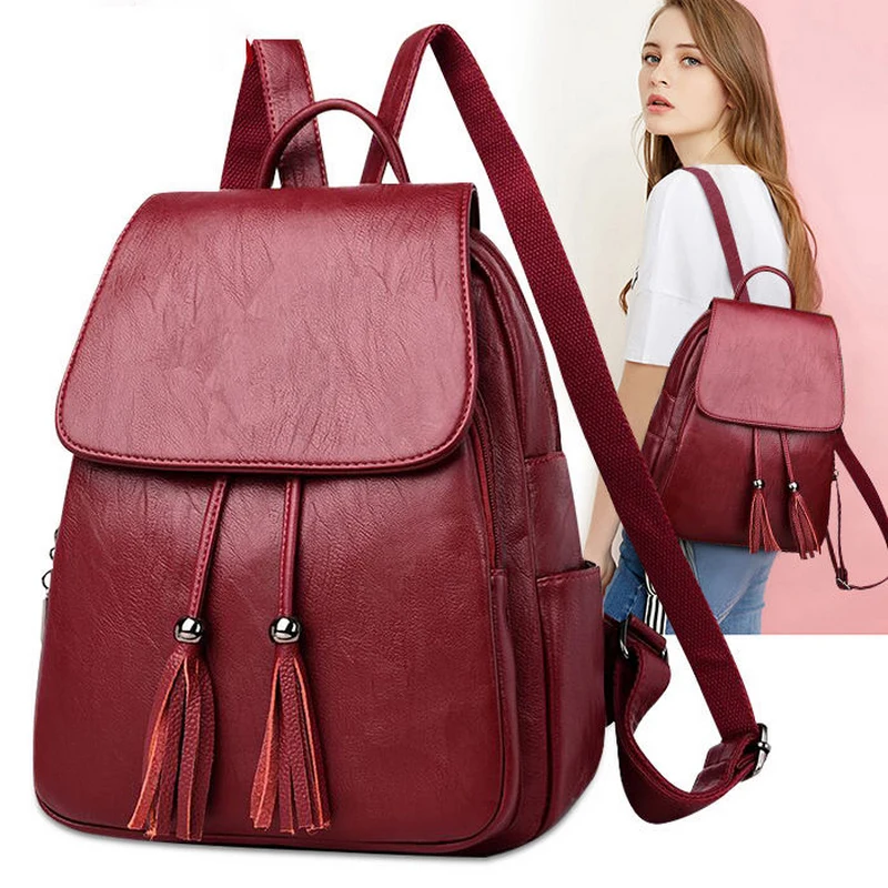 Женский рюкзак с кисточками черный/красный однотонный из мягкой искусственной