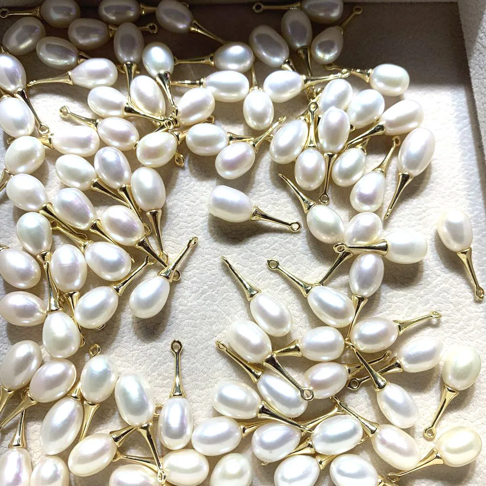 

10PCS, White fresh water pearl tear drop shape with gold color bail loop DIY supplies