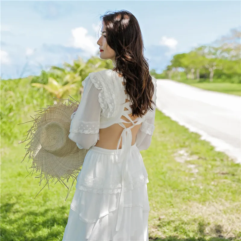

High Quality Beach Spring Vacation Dresses Women Designer Sexy Bandage Hollow Out Backless White Lace Sexy Lantern Sleeve Dress