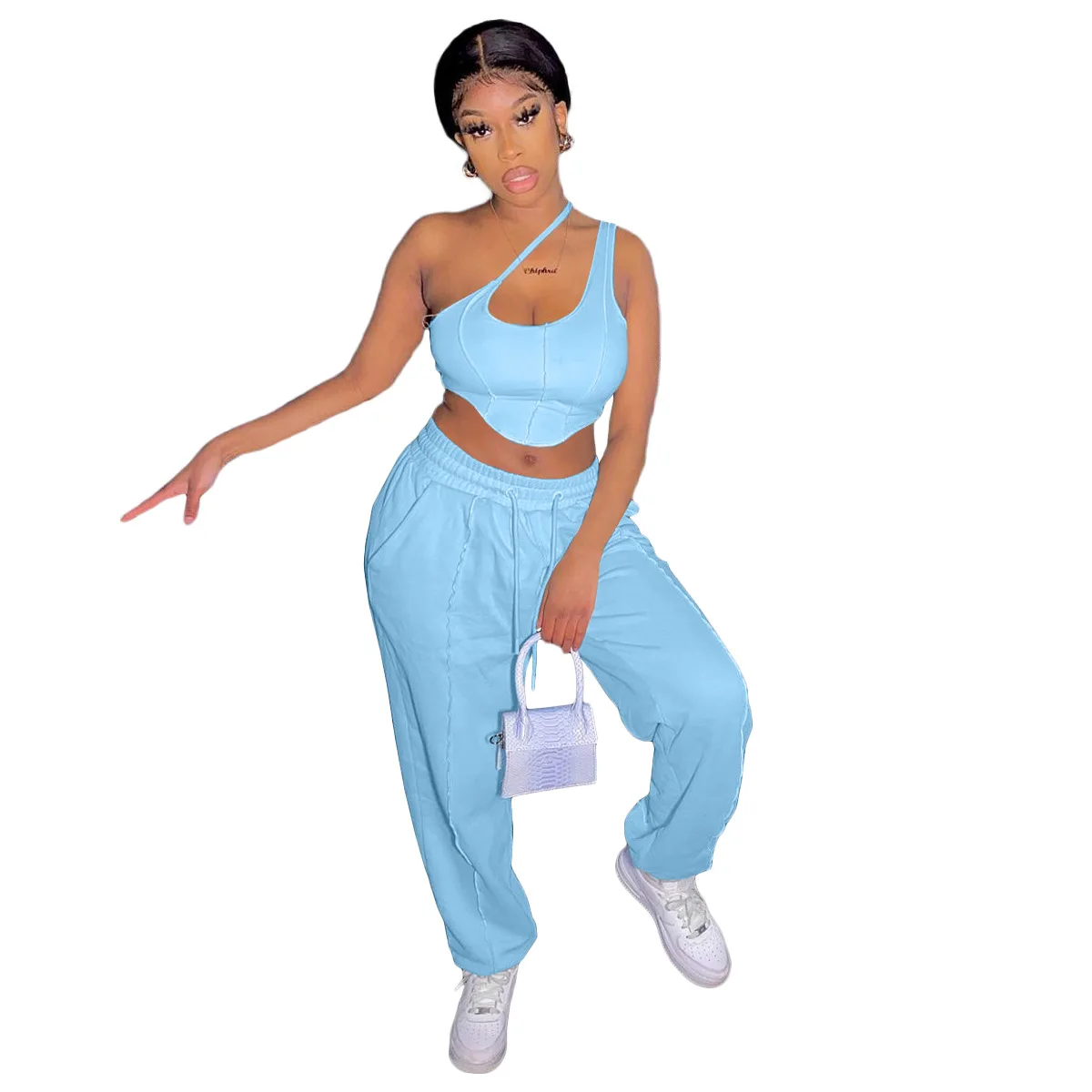 

2021 Hollow Out Women Irregular 2PCS Fashion Slash Neck Sleeveless Tops Loose Cross Pants Women Solid Nightclub Party Suits