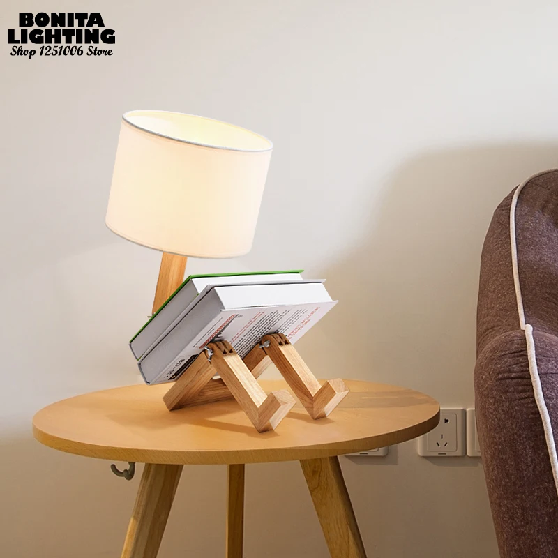 Humanoid bedside desk lamp Nordic simplicity table light Joint folding naughty little man Reading table lamp
Humanoid bedside desk lamp Nordic simplicity table light Joint folding naughty little man Reading table lamp