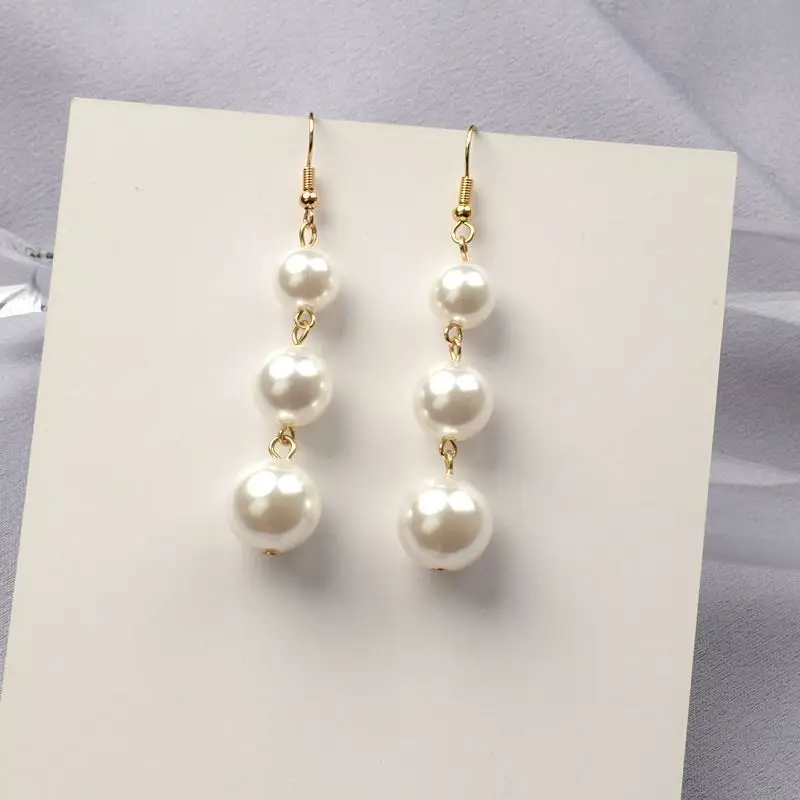 

Pearl string long fairy tassel earrings women's new tide net red earrings