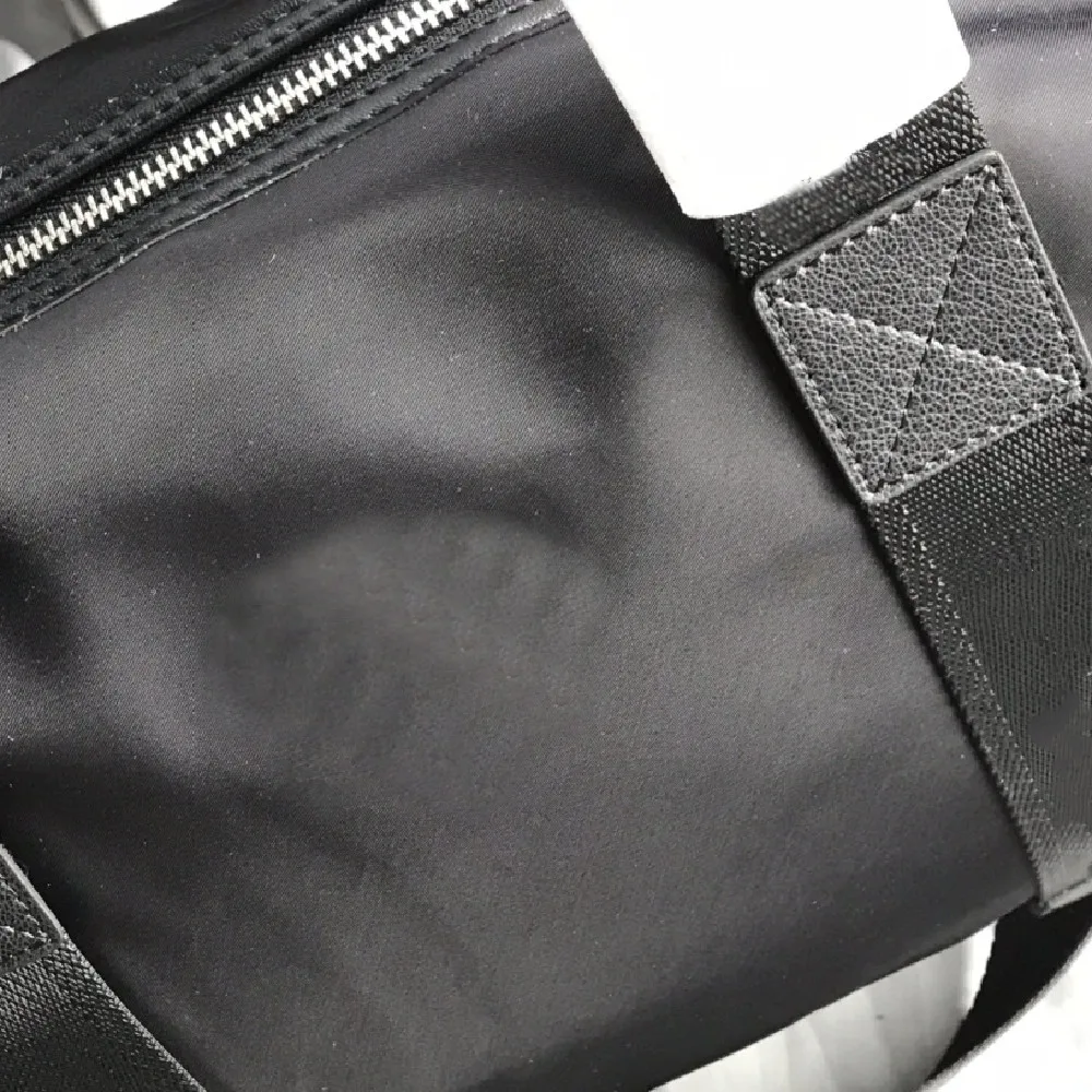 

2021 new men's nylon fabric business casual one-shoulder messenger clutch39cm