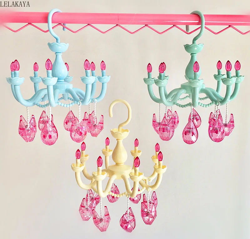 

Cute Japan Action Figure Printed Plastic Chandelier Hanger Magic Multi-function hanger For Clothes Socks Towel Home Storage Rack