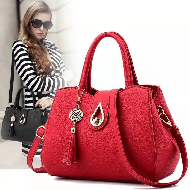 

Women's shoulder bag Ladie Lock Korean version Messenger red black water drop embroidered lattice set clutch female Shipping 729