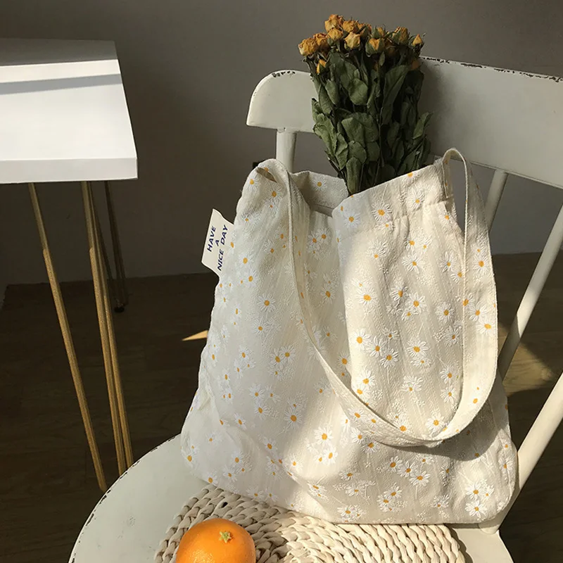 

Bolso de hombro de lona con diseo de margaritas en relieve para mujer bolsa de mano Floral informal bolso de compras para libros