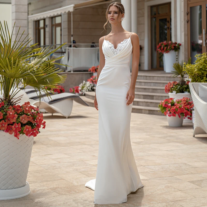 

Elegant White Long Wedding Dresses 2021 Sexy Mermaid Backless Sleeveless V-Neck Lace Appliques Bridal Wedding Gown Custom Size