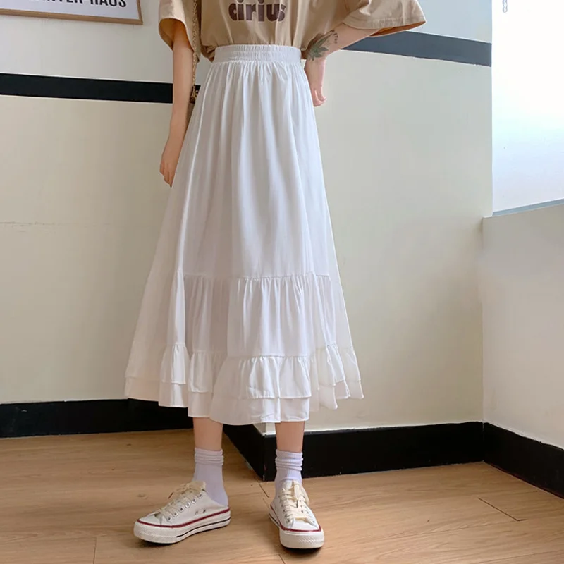 Женская юбка средней длины белая А-силуэта с высокой талией на весну и осень