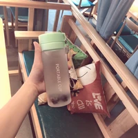 plastic water bottles 600800ml plastic cup travel portable camping cup creative frosted sport bottle with tea gap and rope