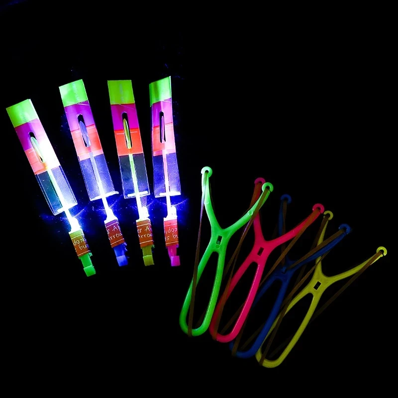 

1PCS/Set Large Slingshot Outdoor Shining Rocket Flash LED Elastic Helicopter Rotating Flying Toy Arrow Gift Children Fairy
