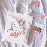 angel new female college canvas shoulder bag fashion casual letter cartoon print large capacity white totes print bags