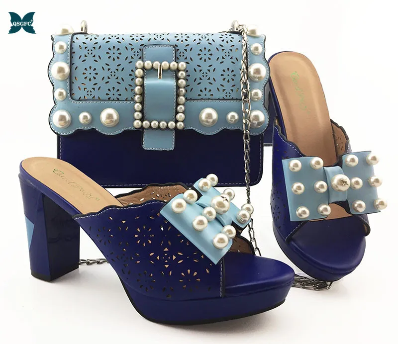 

Новое поступление; сезон осень; комплект из туфель и сумочки синего цвета в нигерийском стиле; комплект из туфель и сумочки в итальянском ст...