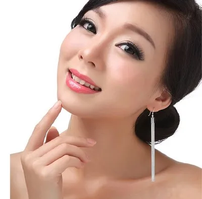 Женские длинные серьги подвески с кисточками серебристого