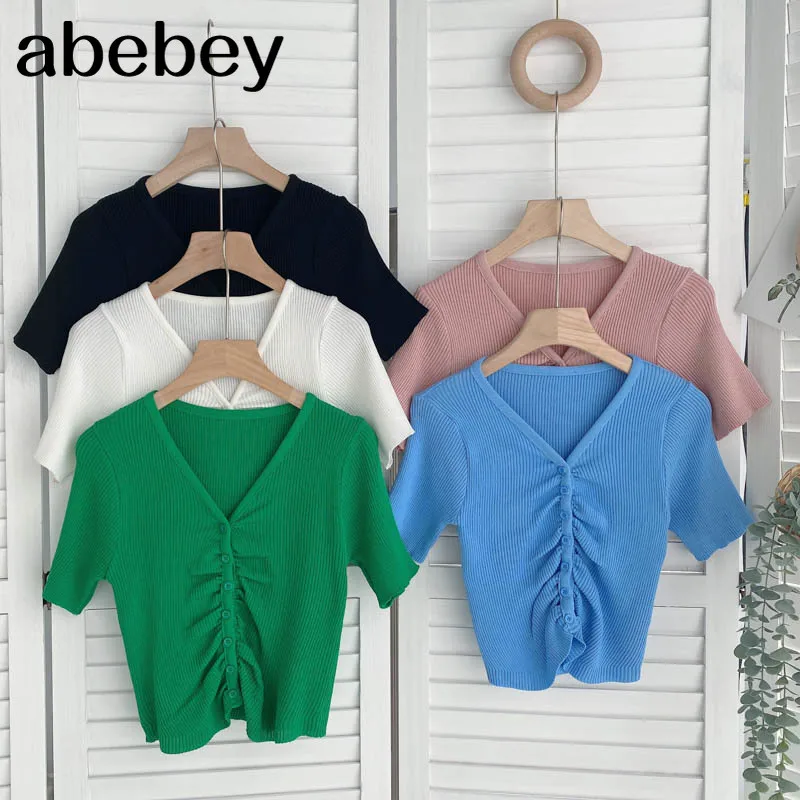 

Женская трикотажная блузка с V-образным вырезом и рюшами