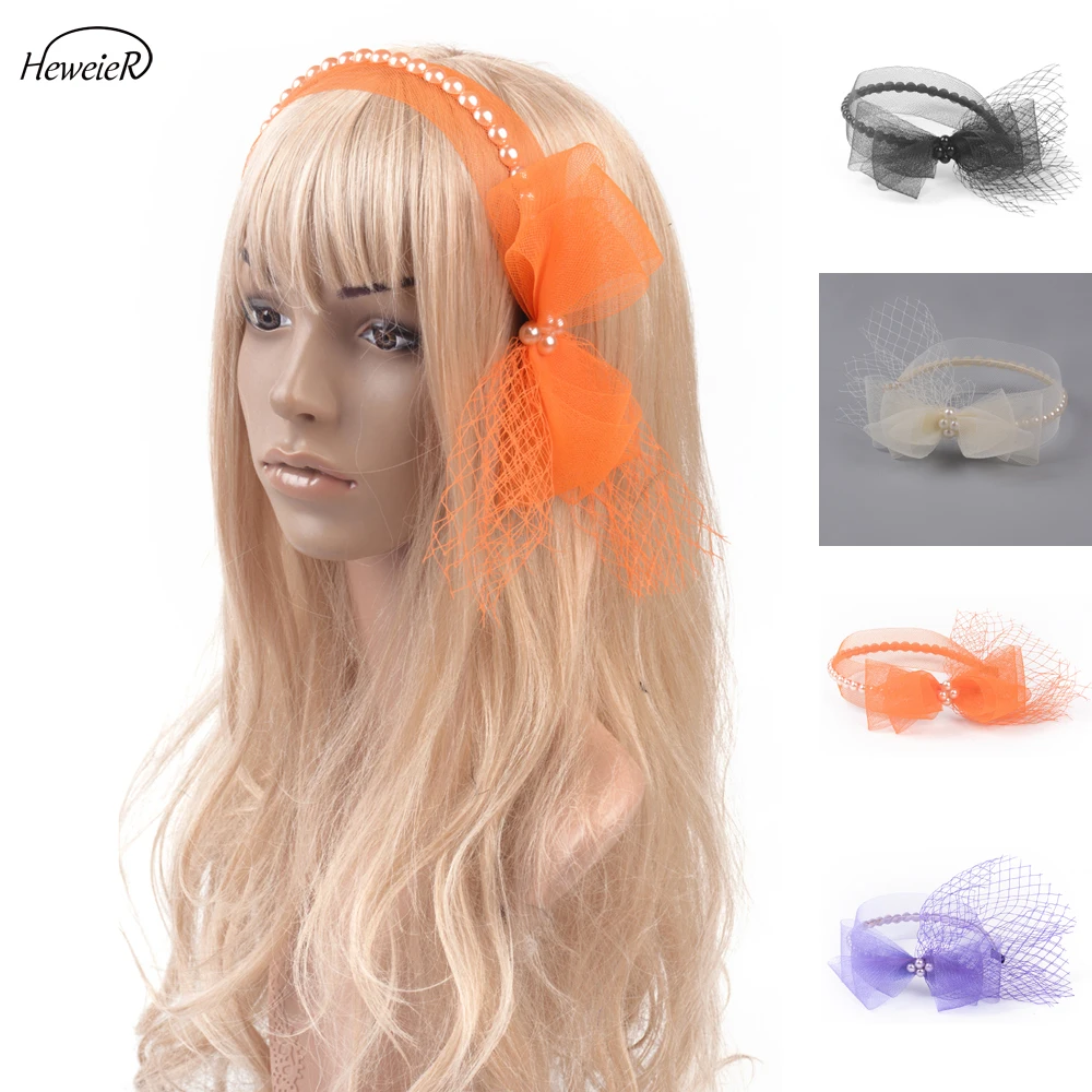 

Повязка на голову с бантом и бусинами для невесты