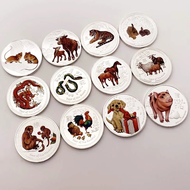 Памятные монеты с изображением австралийского зодиака животное телец лошади